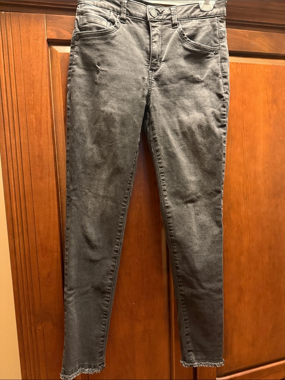 Women's Black Skinny Jeans with Frayed Hem